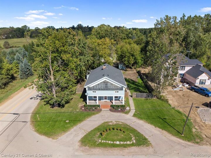 Property Photo:  51390 7 Mile Road  MI 48167 