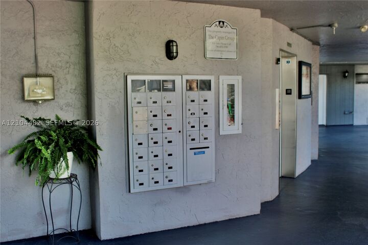 Property Photo:  18000 NW 68th Ave 409A  FL 33015 
