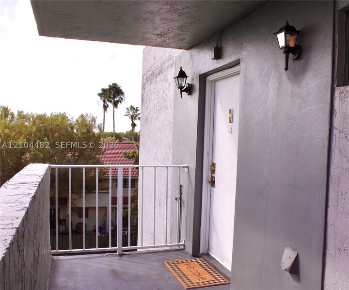 Property Photo: 18000 NW 68th Ave 409A FL 33015