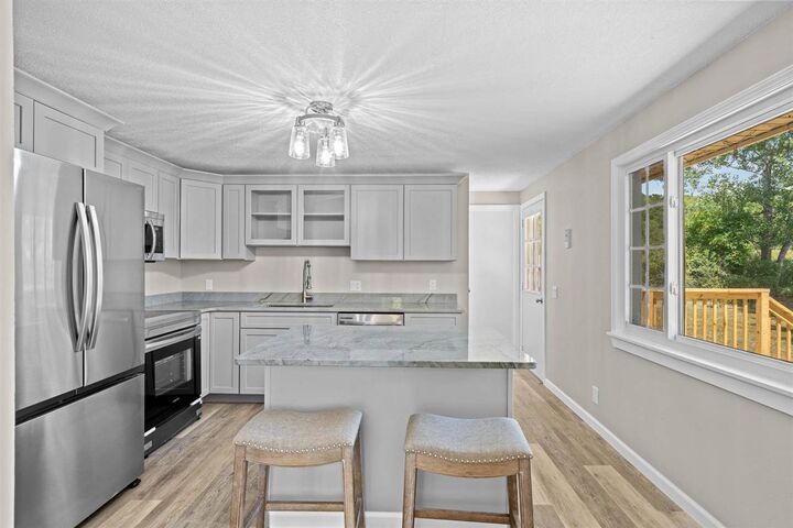 Property Photo:  332 N M-75  MI 49712 