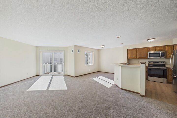 Property Photo: 1392 Carling Drive 208 MN 55108