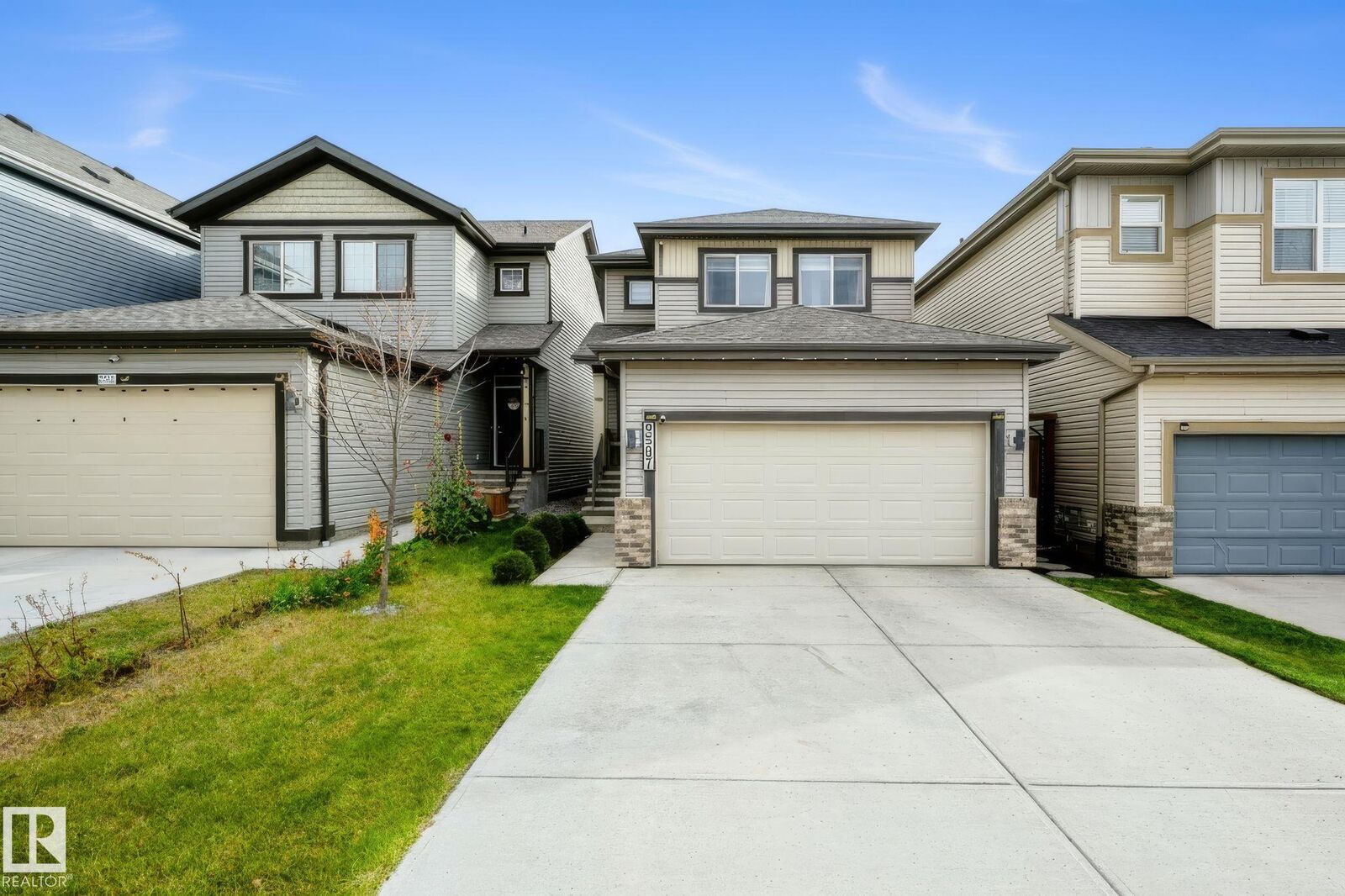 Property Photo:  9507 228 Street NW  AB T5T 7H5 