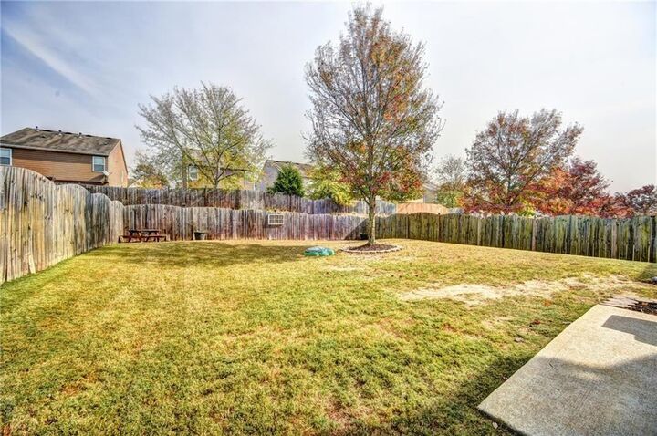 Property Photo:  5915 Ellington Cove  GA 30040 
