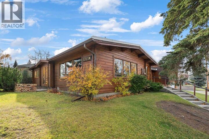 Property Photo:  4703 14A Street Southwest  AB T2T 3Y5 
