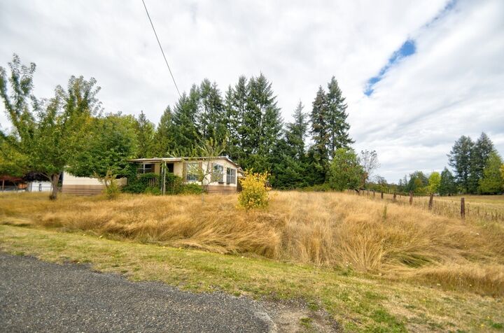 Property Photo:  628  35th Avenue NE  WA 98506 