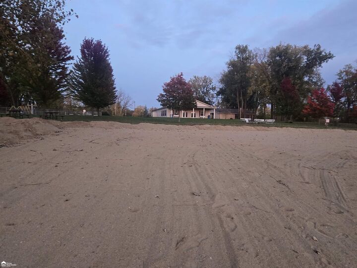 Property Photo:  10001 Goodall Road 57  MI 48429 