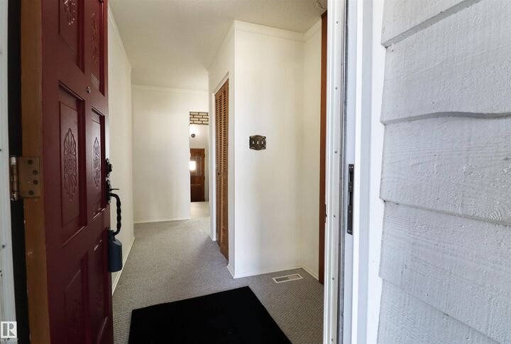 Property Photo:  9527 151 Avenue NW  AB T5E 2R2 