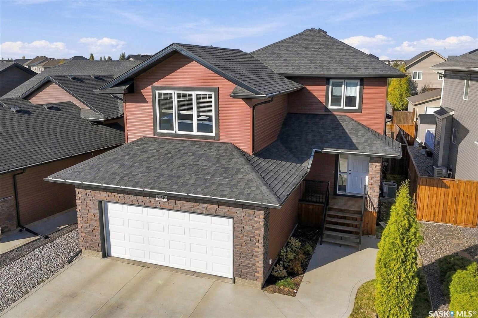 Property Photo:  319 Langlois Way  SK S7T 0M9 