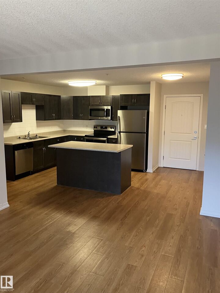 Property Photo:  6124 Stanton Dr SW A309  AB T6X 0Z4 