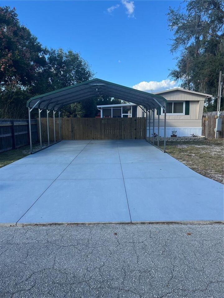 Property Photo:  10943 SE 131st Place  FL 32179 