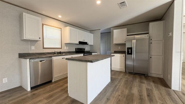 Property Photo:  12015 Westbay Avenue  FL 34654 