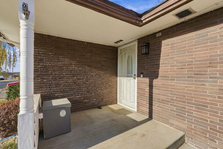 Property Photo:  7432 N Sutherlin St  WA 99208 