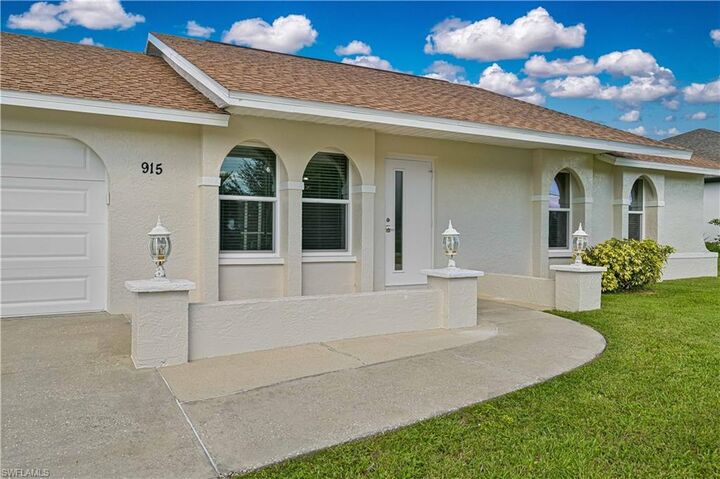 Property Photo:  915 SW 31st Ter  FL 33914 