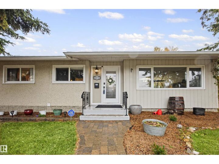Property Photo: 10235 Fulton Rd NW AB T6A 3T5