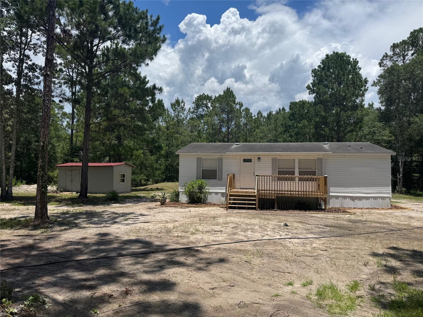 Property Photo:  7420 NE 111th Place  FL 32609 