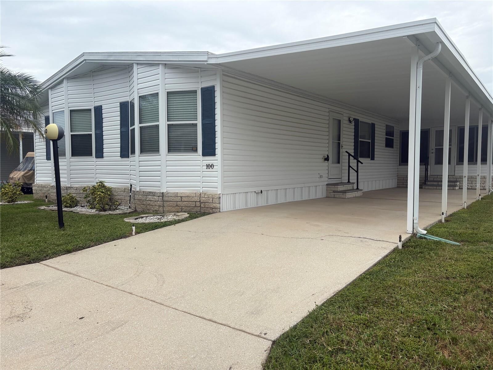 Property Photo:  5707 45th Street E 100  FL 34203 