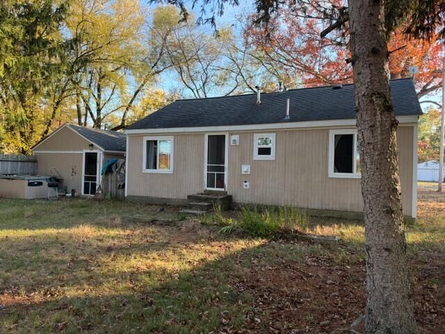 Property Photo:  1487 E Pine Hill Avenue  MI 49349 