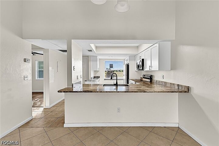 Property Photo:  3739 SW 9th Avenue 113  FL 33914 