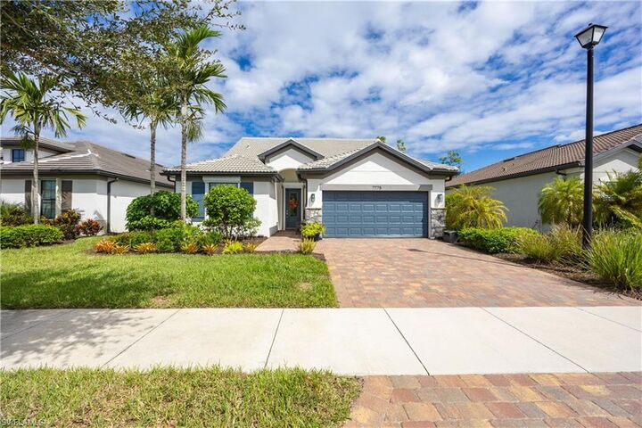 Property Photo:  7775 Winding Cypress Dr  FL 34114 