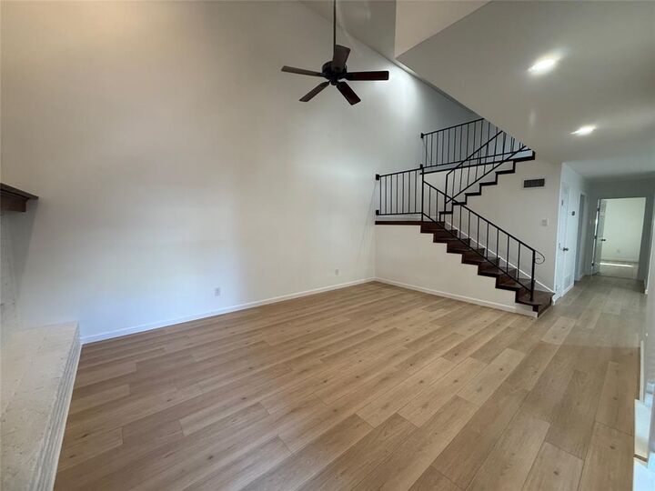 Property Photo: 207 E Harwood Road 18 TX 76039