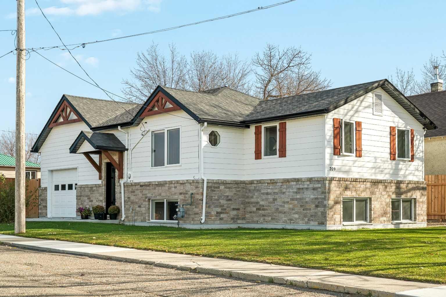 Property Photo:  209 2 Street N  AB T0K 1V0 