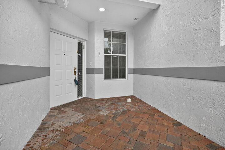 Property Photo:  7886 Laina Lane Apt 1  FL 33437 