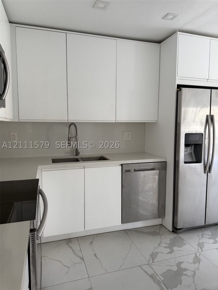 Property Photo:  17560 Atlantic Blvd 106  FL 33160 
