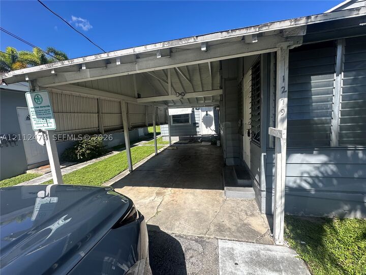 Property Photo: 1271 NE 32nd St 1279 FL 33334