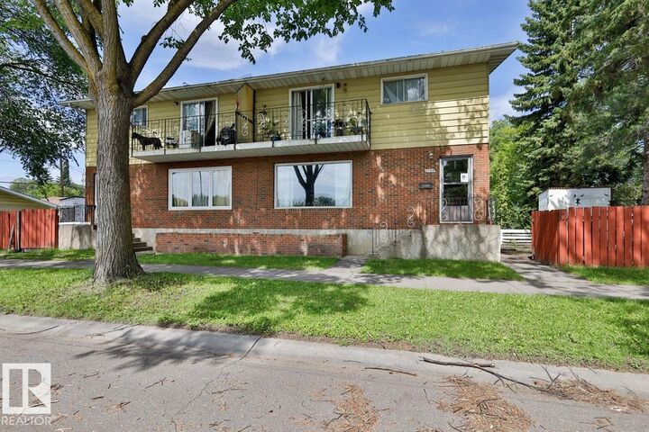 Property Photo:  8704 8708 117 Avenue NW  AB T5B 4M1 