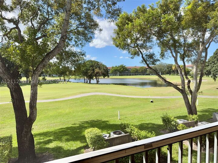 Property Photo:  400 SW 134th Way 210F  FL 33027 