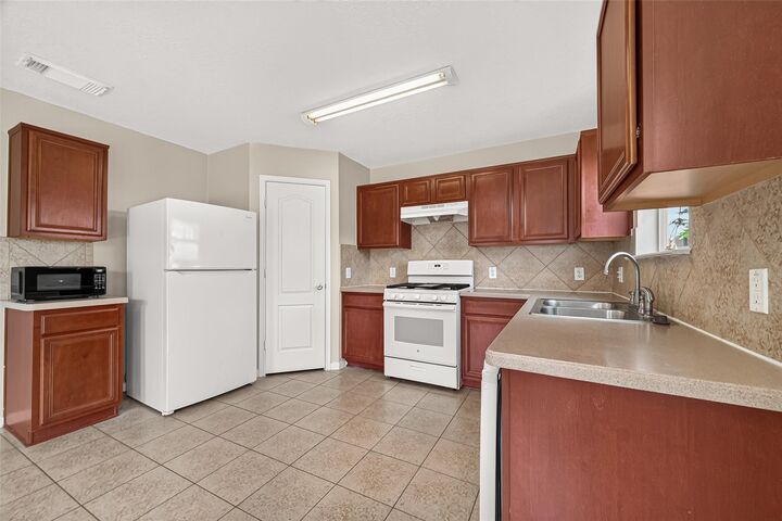 Property Photo:  3519 Fuller Bluff Drive  TX 77386 