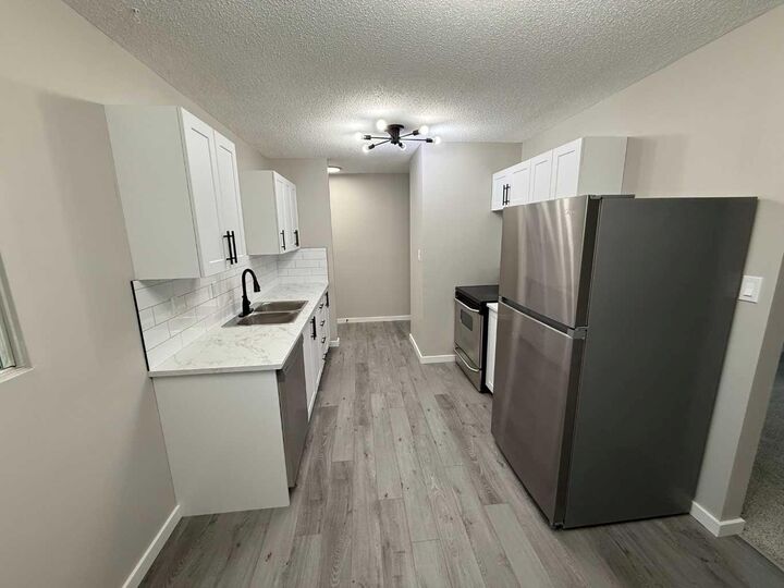 Property Photo:  15 Laval Court W  AB T1K 4G2 