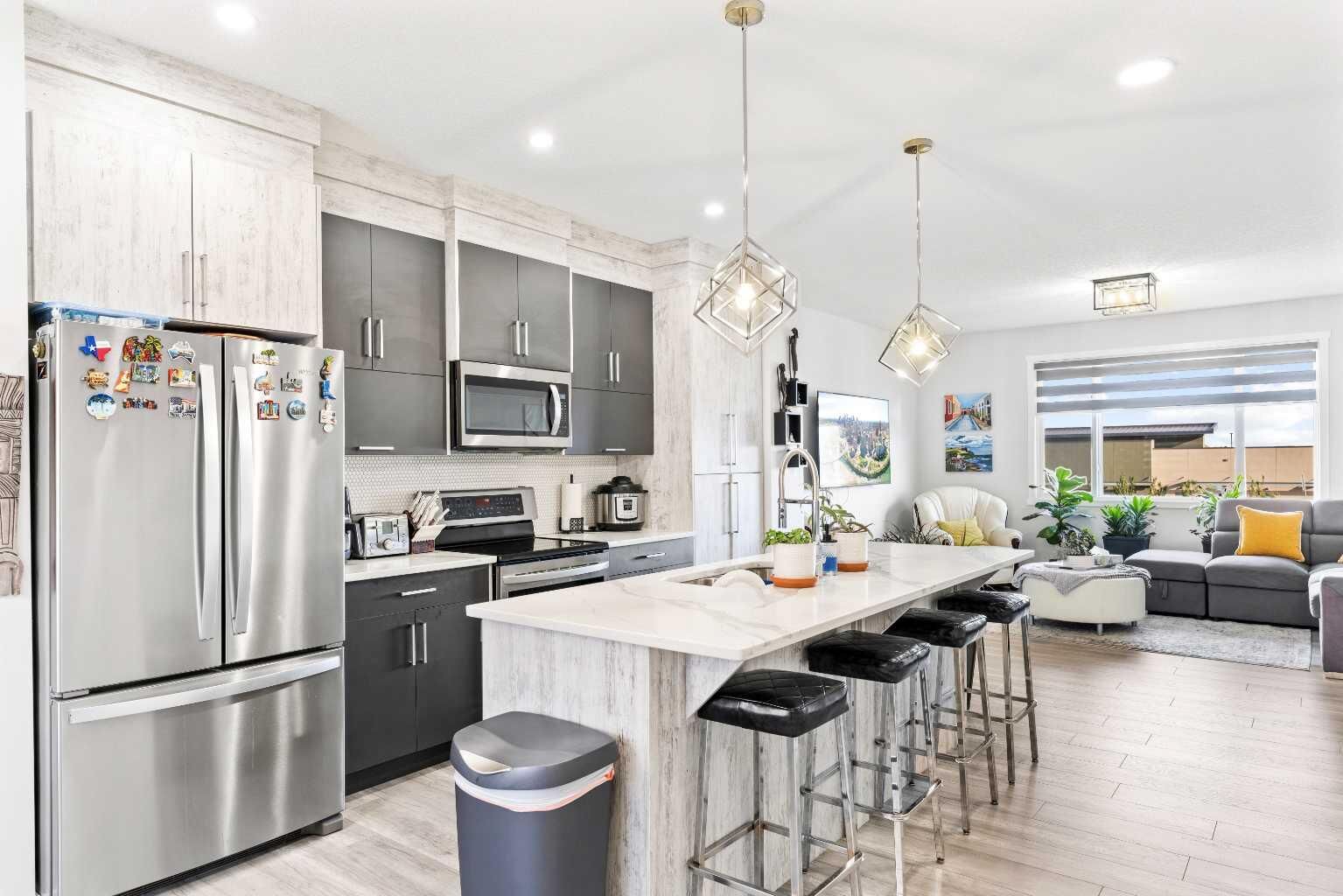 Property Photo:  11428 52 Street NE 303  AB T3N 1S2 