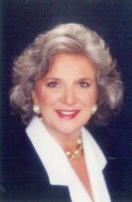 Christine Schott,  in Coronado, Napolitano & Associates