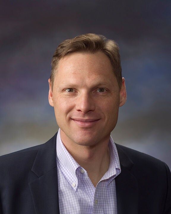 Timothy Grader,  in Greenfield, Cohn & Company ERA Powered