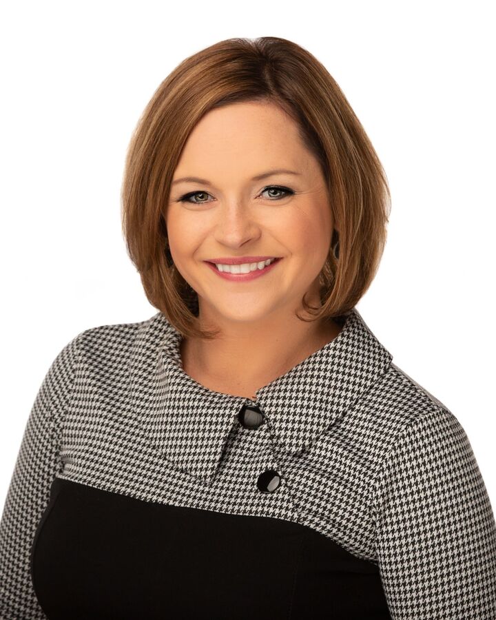 Katie Wadzinski, Real Estate Broker in Schofield, Action