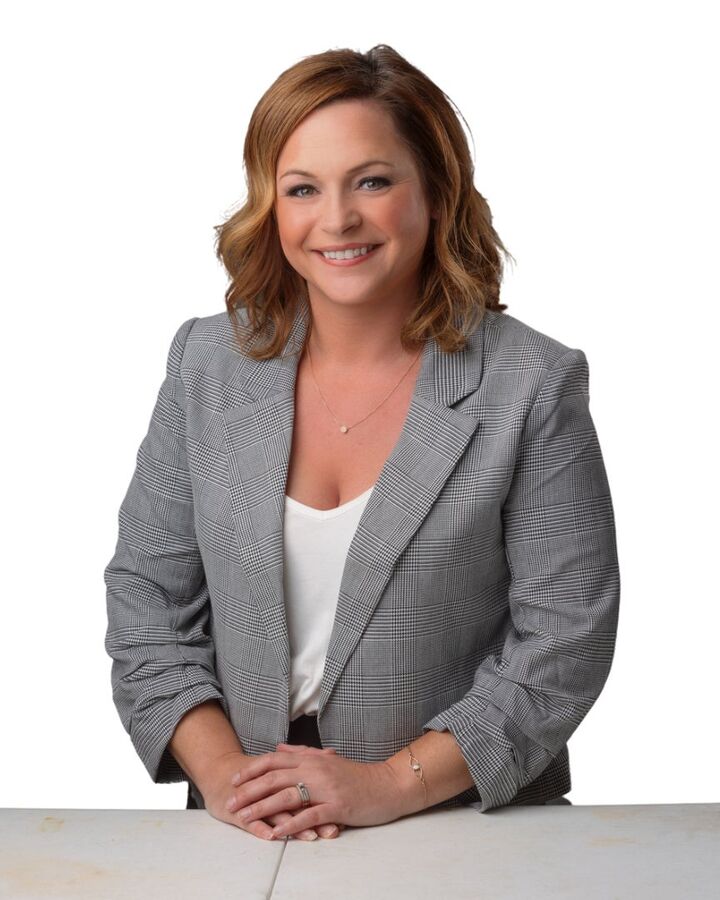 Katie Wadzinski, Real Estate Broker in Schofield, Action